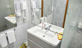 Africana Family Room Badezimmer