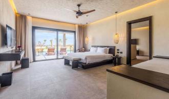 Naga Bay Swim-up-Familiensuite Schlafzimmer