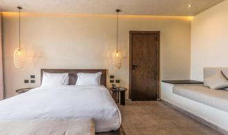 Naga Bay Doppelzimmer mit Meerblick Doppelbett