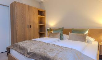 Familienzimmer mit/ohne Mansarde Schlanitzen Alm Schlafzimmer