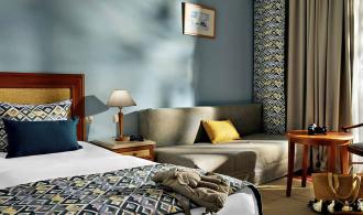 Africana Double Room Superior Swim-Up Schlafzimmer